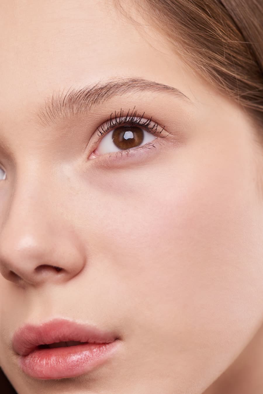 Sydney Ann model with bare, dewy skin and brown eyes, Austin